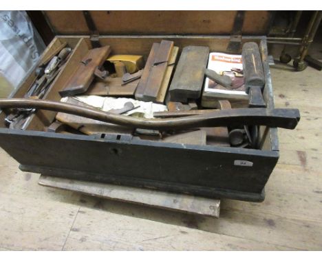 Tool box containing a large quantity of 19th Century woodworking tools and moulding planes, some rosewood with brass inlays e