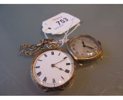Continental 18ct yellow gold floral engraved fob watch having enamel dial with Roman numerals, with part of a gold fob chain 