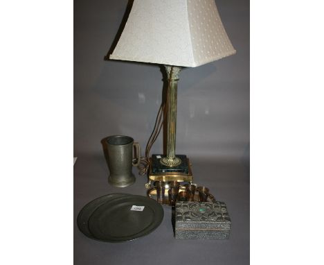 Two small antique pewter plates, brass Corinthian column table lamp and other metalware