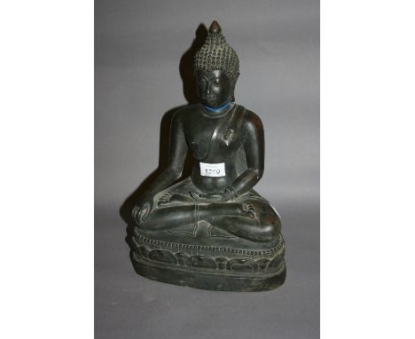 Brown patinated bronze figure of seated Buddha, 14ins high