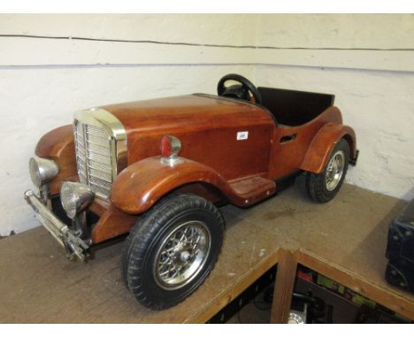 Child's laminated wooden battery operated toy car (at fault)