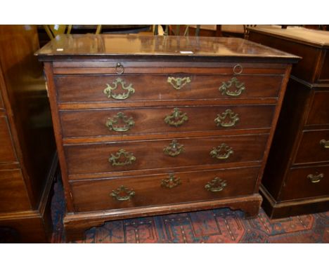 George III mahogany dwarf chest with a brushing slide above four long graduated drawers with brass handles and escutcheons ra