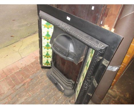 Victorian cast iron tile inset fire surround