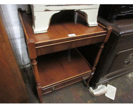 Reproduction yew wood two tier lamp table with single drawer on turned tapering supports with brass casters