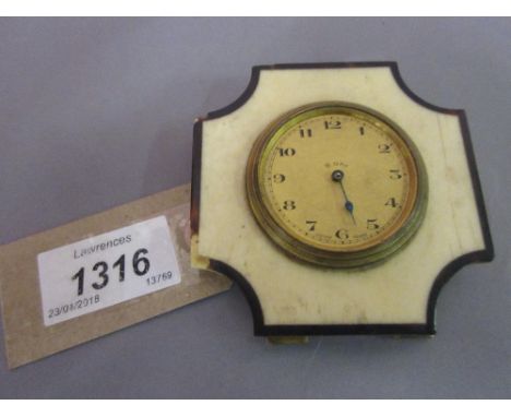Small early 20th Century ivory mantel clock with eight day movement, the gilt dial with Arabic numerals (at fault)