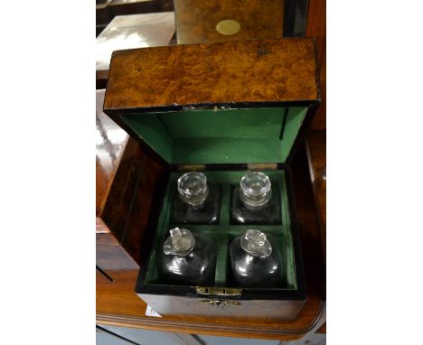 19th Century square shaped walnut decanter box containing two pairs of glass decanters