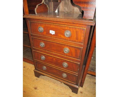 Similar reproduction mahogany four drawer inlaid bedroom chest on bracket feet 
