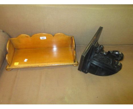 Light oak table top bookrack, ebonised wall bracket with carved gryphon support and a shield shaped swing frame dressing tabl