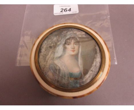 19th Century ivory, tortoiseshell and gilt brass mounted circular snuff box, the cover inset with a watercolour miniature por