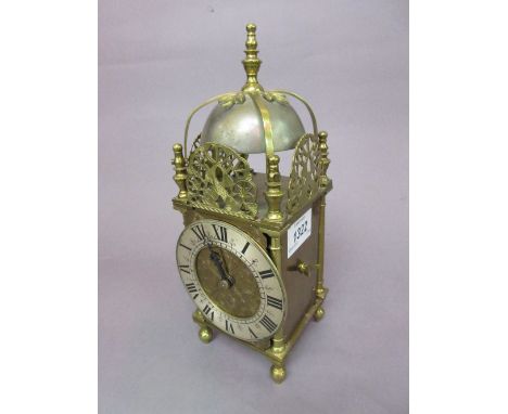 Early to mid 20th Century brass miniature lantern clock with two train carriage type movement