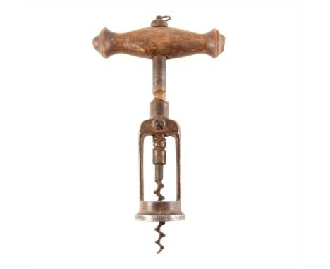 An old corkscrew, turned beechwood handle, 17cm overall.