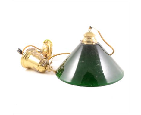A rise-and-fall ceiling light with green glass shade, by Christopher Wray of London, lacquered brass weight and rose.