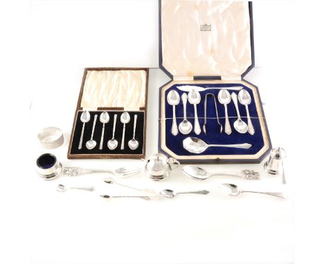 A cased set of silver coffee spoons, London 1930, silver engine turned napkin ring, a three piece condiment set, Birmingham 1