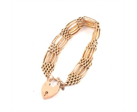 A rose metal gate link bracelet, 14mm five bars wide and fitted with a padlock fastener, marked on the padlock and a link 9c,