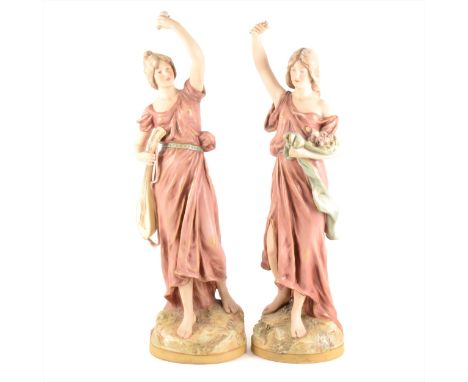 Pair of Royal Dux figures, modelled as a young lady with a lute and a young lady with roses, numbered respectively 1698 and 1