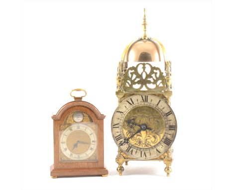 A reproduction brass lantern clock, French key-wind movement, 30cm; and a small walnut cased mantel clock, (2).