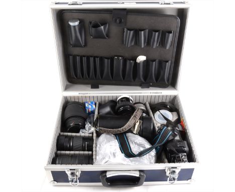 Minolta SLR camera, with good selection of camera lenses and hard carry case.
