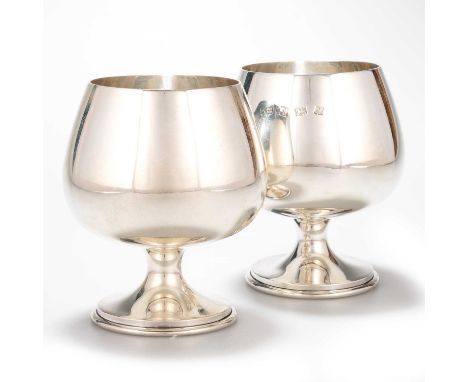 A PAIR OF ELIZABETH II SILVER GOBLETS  by A T Cannon Ltd, Birmingham 1972, the plain circular bowls raised on a stepped circu