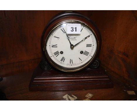 A Comitti eight day mantel clock