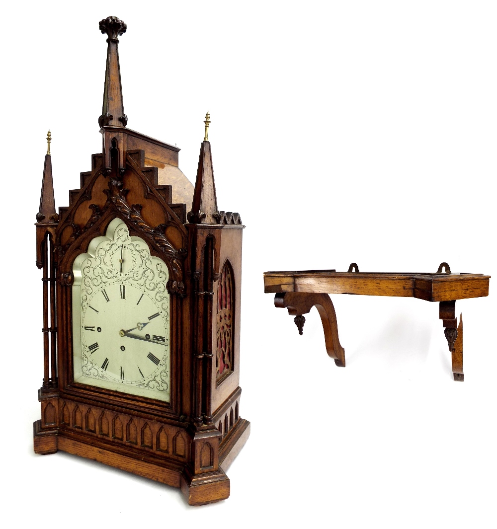 Oak Gothic style triple fusee bracket clock and bracket, the movement