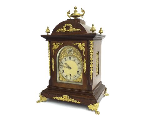 Walnut three train mantel clock made for the Turkish market, the German movement with platform escapement and playing on six 