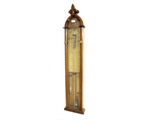 Admiral Fitzroy barometer, within a Gothic carved oak glazed case, 46" high