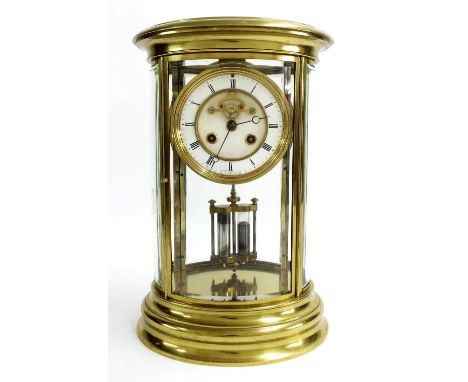 French brass oval two train four glass mantel clock, the movement striking on a bell and with mercury pendulum, the 4.25" cha