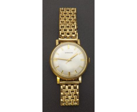 Garrard 9ct gentleman's wristwatch, with presentation inscribed back dated 1972, plated bracelet, 32mm.Condition Report: Move