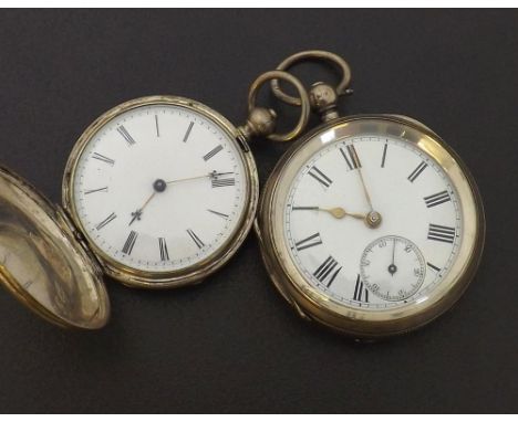 Silver cylinder engine turned hunter pocket watch, 42mm; together with an English silver fusee lever pocket watch in an engin