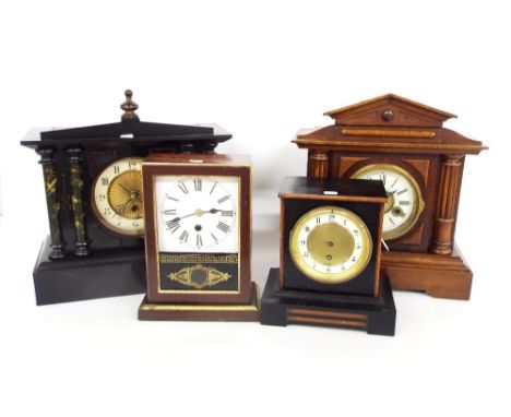 English oak two train mantel clock striking on a gong, the 4.25" cream chapter ring enclosing a recessed gilt centre, within 