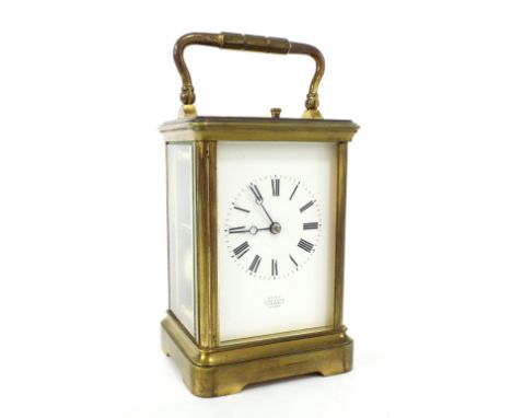 Repeater carriage clock striking on a gong, the movement back plate inscribed with the maker's initials G.L, the dial signed 