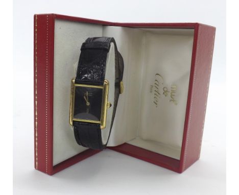 Must de Cartier Tank silver-gilt wristwatch, ref. 6.111852, black dial, quartz, Cartier black leather strap, 24mm *With Carti