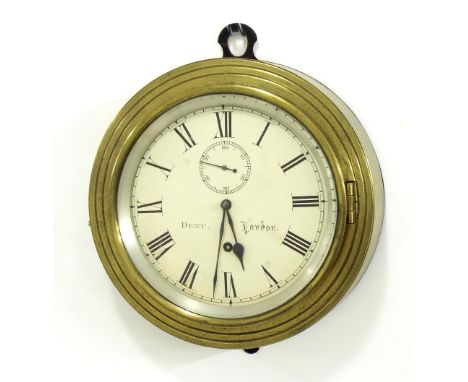 Good small English brass bulkhead wall dial clock, the 4.75" cream dial signed Dent, London, with subsidiary seconds dial, wi