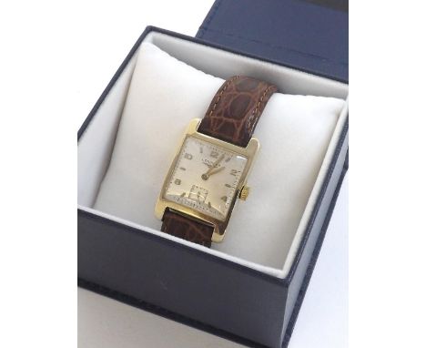 Longines 14k gentleman's curved wristwatch, circa 1949, square silvered dial with Arabic numerals, baton markers and subsidia