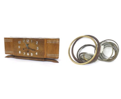 Small quantity of various size bezels; also an Irod walnut cased three train Art Deco mantel clock