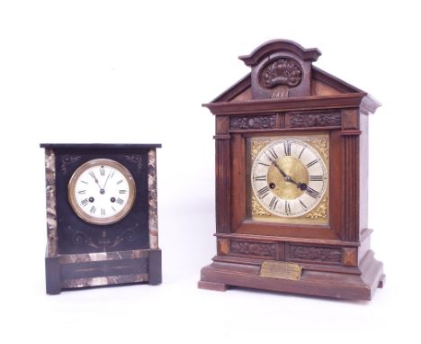 Black slate and grey marble two train mantel clock striking on a gong, 10.25" high; also an oak two train mantel clock striki