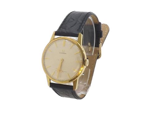 Omega gold plated gentleman's wristwatch, the textured silvered dial with baton markers and subsidiary seconds dial, black st