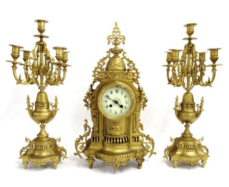 French gilt metal two train mantel clock garniture, the movement with outside countwheel striking on a bell, the 3.75" cream 