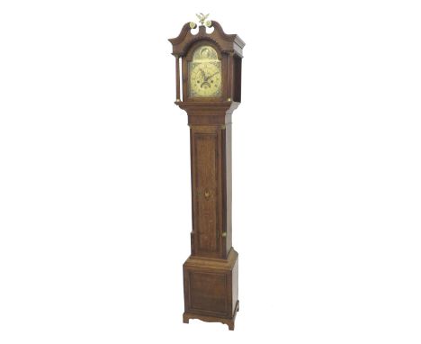 Good oak and mahogany crossbanded eight day grandmother clock, the 8" brass arched dial with brass chapter ring enclosing a f