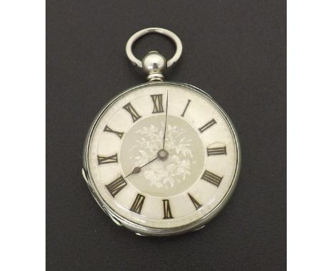 Silver cylinder engraved fob watch, the dial with applied Roman numerals, 41mm; with key. Condition Report: Movement - workin