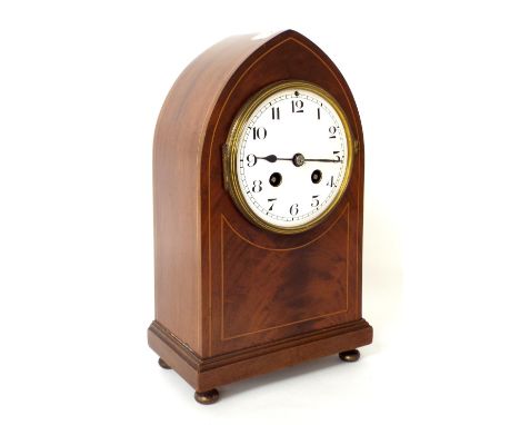 French mahogany lancet two train mantel clock striking on a gong, the 4" white dial within an inlaid stepped case, 9.75" high