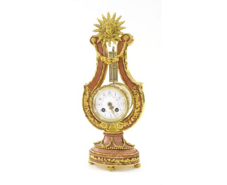 Good French pink marble and ormolu mounted lyre clock, the Vincenti movement with outside countwheel striking on a bell, the 