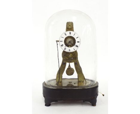 French Exhibition brass skeleton clock with alarm, the back plate and 2.25" white enamel chapter ring signed Pierret á Paris,