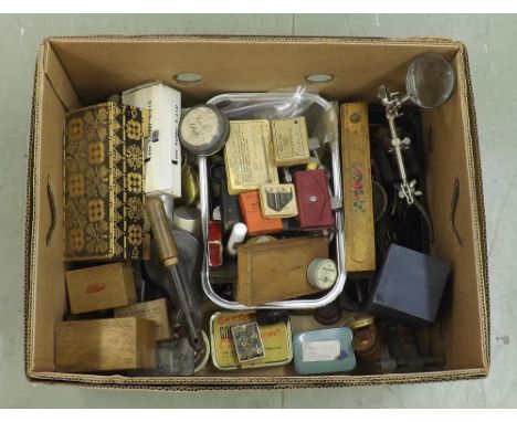 Box containing a quantity of various watchmakers' tools
