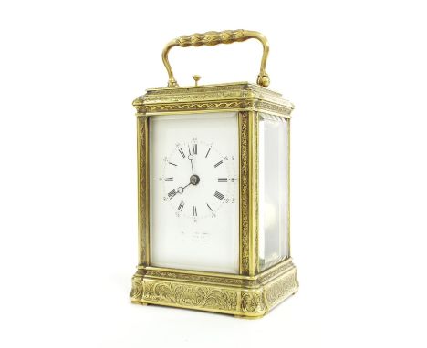 Good small English brass repeater carriage clock striking on a bell, the dial indistinctly inscribed Frodsham, within a folia
