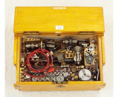 Good Lorch small clock/watchmaker's lathe, within a light wooden hinged case with numerous collets and other accessories, 18"