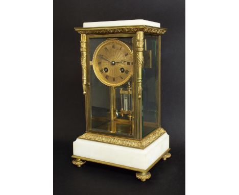 French gilt metal and white marble two train four glass mantel clock, the movement striking on a gong, the 3.25" gilt metal d