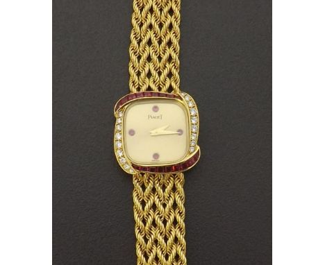 Fine Piaget 18k yellow gold ruby and diamond lady's bracelet watch, ref. 4926 E 21, the square cushion shaped champagne dial 