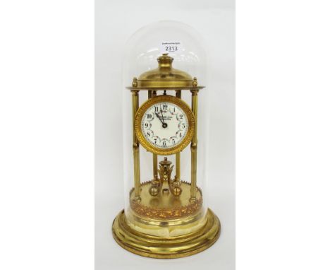 Brass torsion mantel clock, the 3.5" cream dial signed Schonwald Jmre, Budapest - Pws over a ball pendulum and within a six p