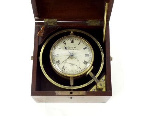 Small interesting marine chronometer, the 3" silvered dial signed Arnold, London, no. 435 over a subsidiary seconds dial, wit